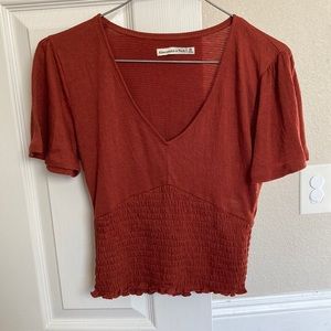 Abercrombie red/orange v neck smocked waste tee